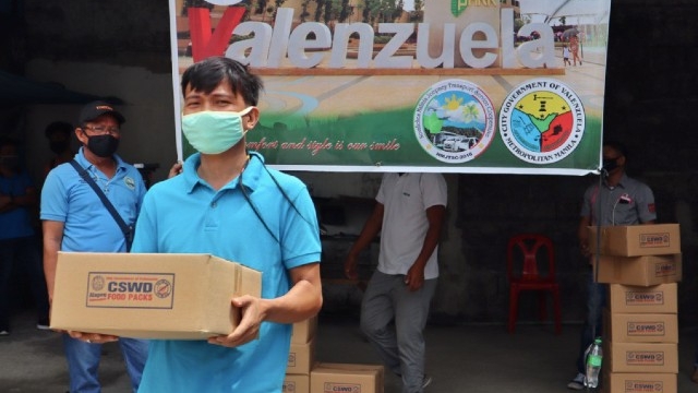 NO HUNGRY VALENZUELANO. The city government gives additional food packs to jeepney drivers left jobless during the lockdown. Photo from Valenzuela City government