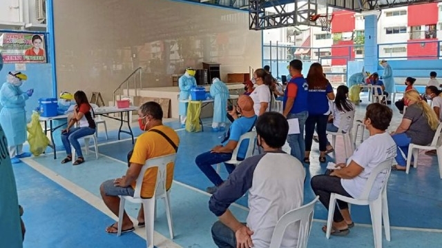 FRONTLINERS. Barangay officials undergo coronavirus testing. Photo from Valenzuela City government