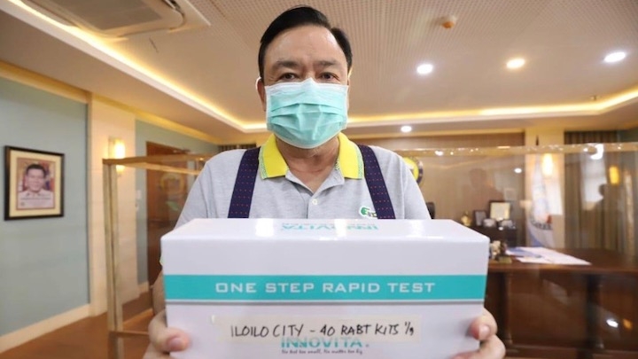 MORE TESTS. Treñas holds a box of newly-procured rapid test kits in his office. Photo from Iloilo City government