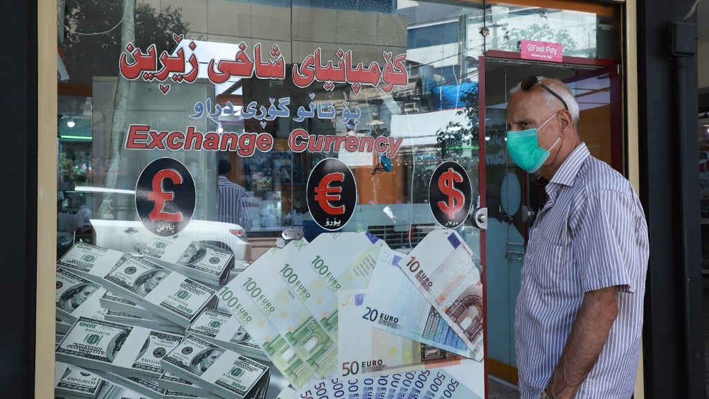 Not cashing in: Virus hits Iraq's Iran-US money trade