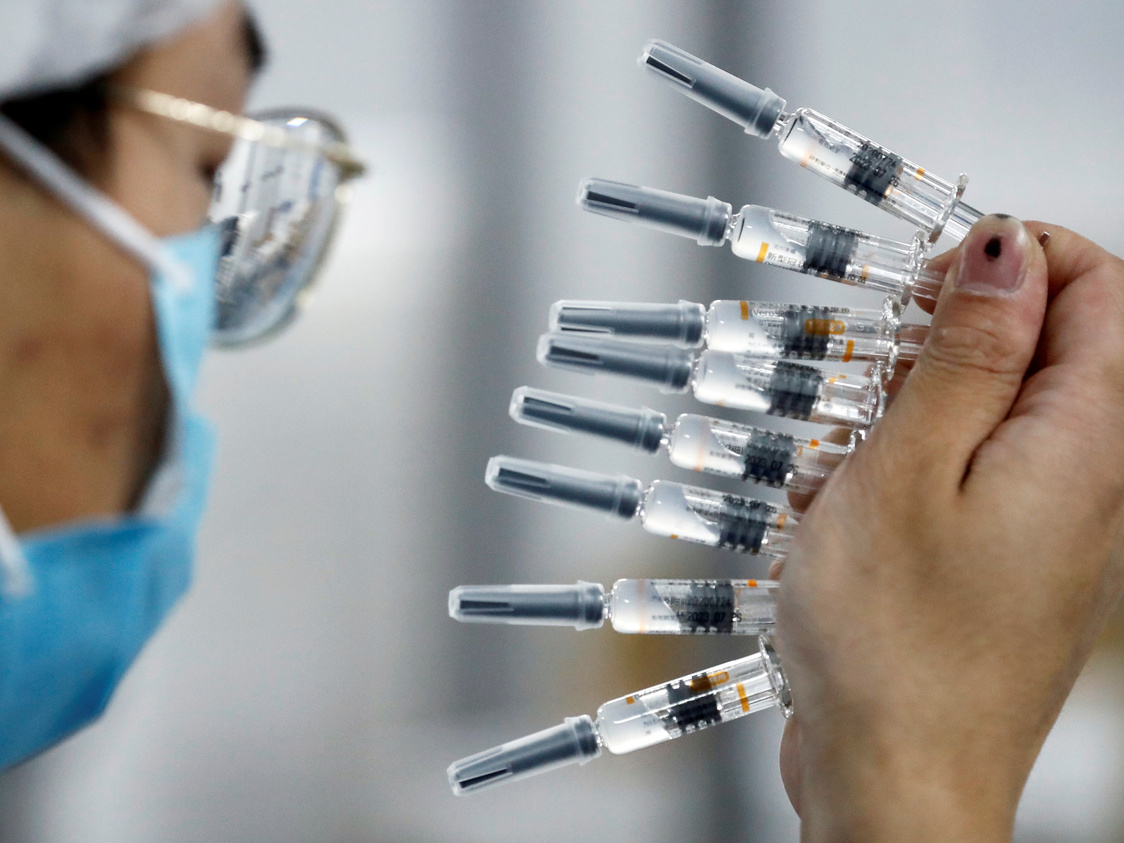 Indonesia approves China's Sinovac vaccine as infections surge