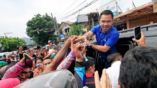 Not vote buying': Pacquiao to stop cash aid only when campaign period starts