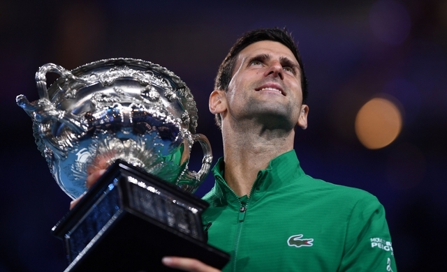 Djokovic beats Thiem in fiveset thriller to win eighth Australian Open