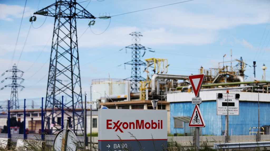 ExxonMobil pledges emissions cut as investor campaign targets board