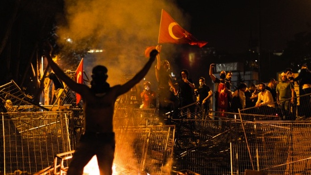 Protesters celebrate after police leave Istanbul square